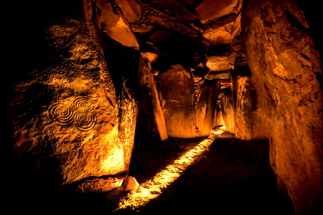 A ray of light shining through a hole in an ancient building