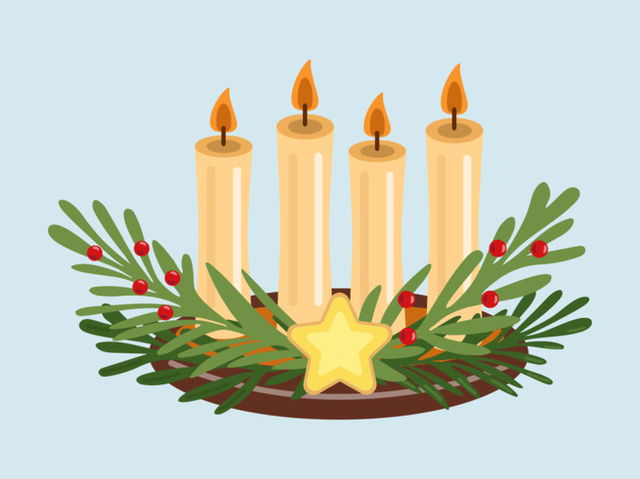 Corona de adviento con cuatro velas encendidas