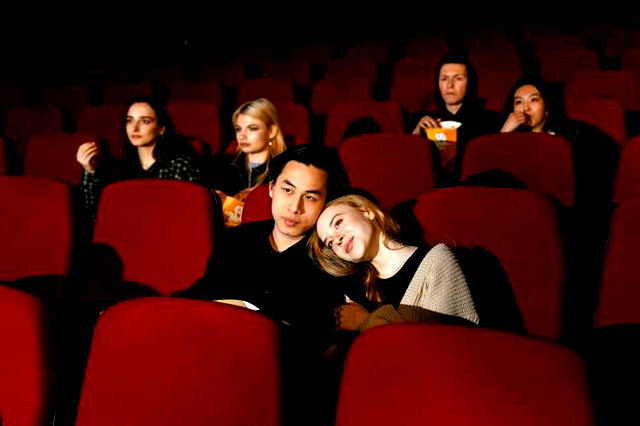 A Group of People Watching Movie