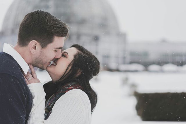 A man and woman kissing