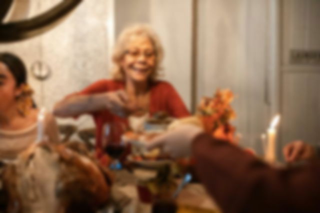 A old woman eating happily