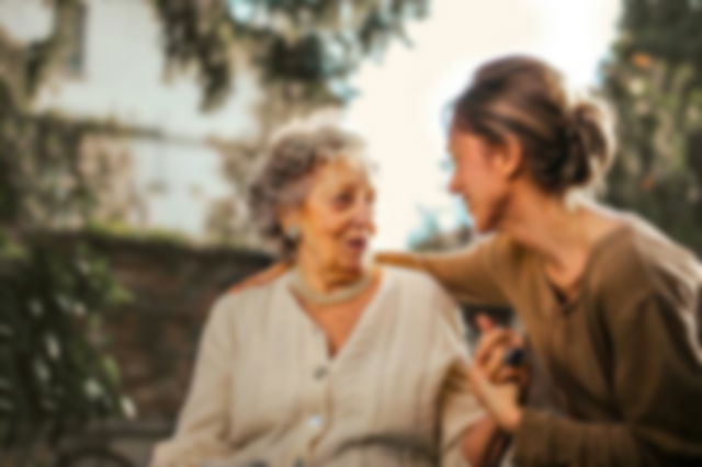 A woman with her old grandmother