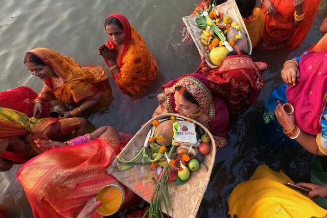 Women performing Chhath puja