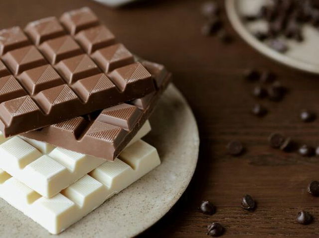 Photo Of Chocolate Bars On Ceramic Plate