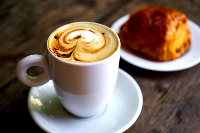 A cup of coffee on a table