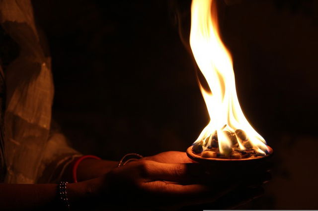 woman holding a light