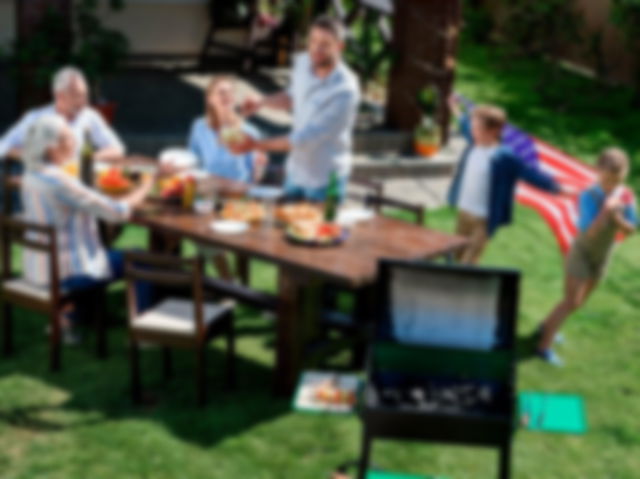 A family enjoying barbeque on the 4th of July