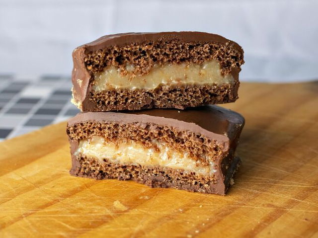 Slices of Chocolate Fudge Cake on Wooden Chopping Board