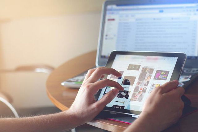 woman using tablet