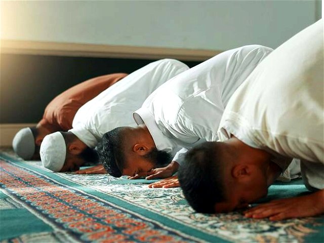Muslim Men Praying in a Mosque