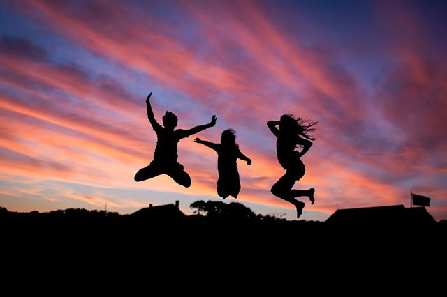 Shadow OF Three friends jumping