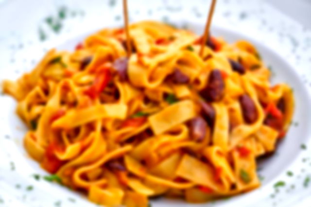 Pasta on White Plate on Focus Photo