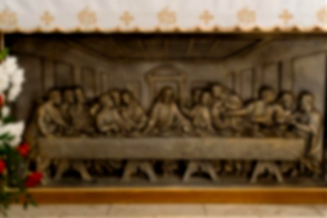 The famous scene of The Last Supper, decorating an alter at the front of a church