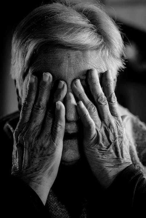 elderly woman crying