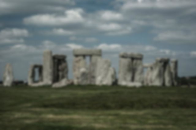 Stonehenge standing on a dramatic day, dark clouds in the sky