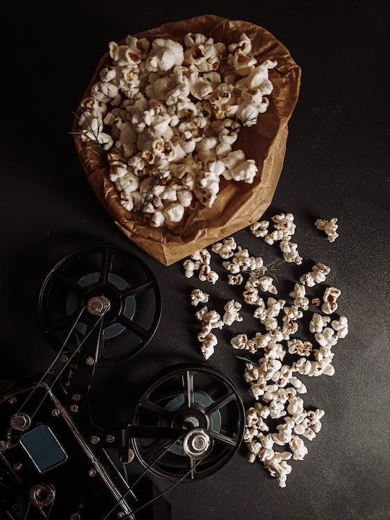 An image of popcorns in a jute bowl