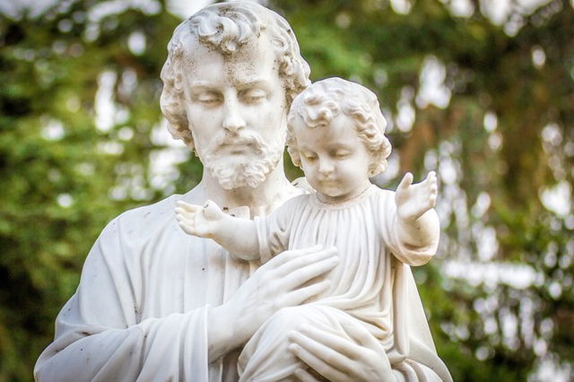 A Sculpture Of Saint Joseph and Baby Jesus