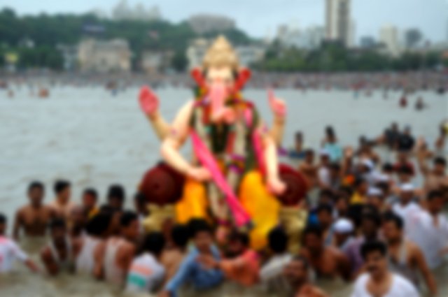 Immersion of the idol of Lord Ganesha in water