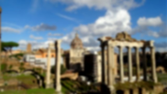 The ruins of the temple of Saturn in Rome on a clear day