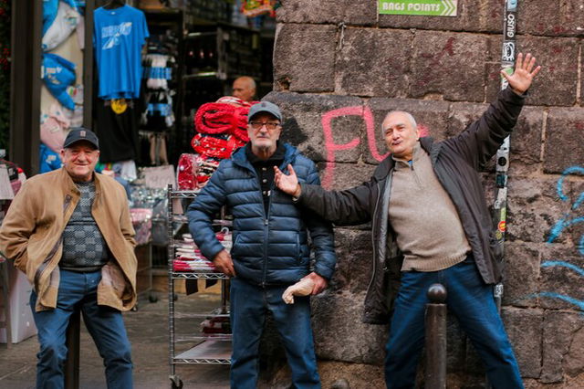 Three men having fun in Italy