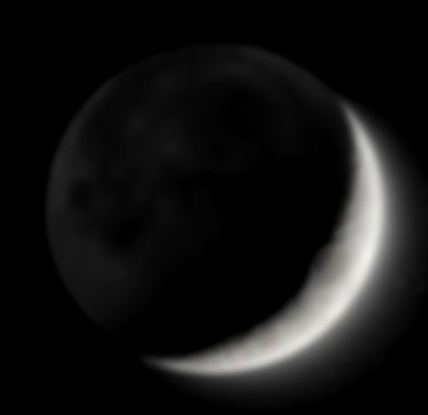 An Image Of A Waxing Crescent Moon