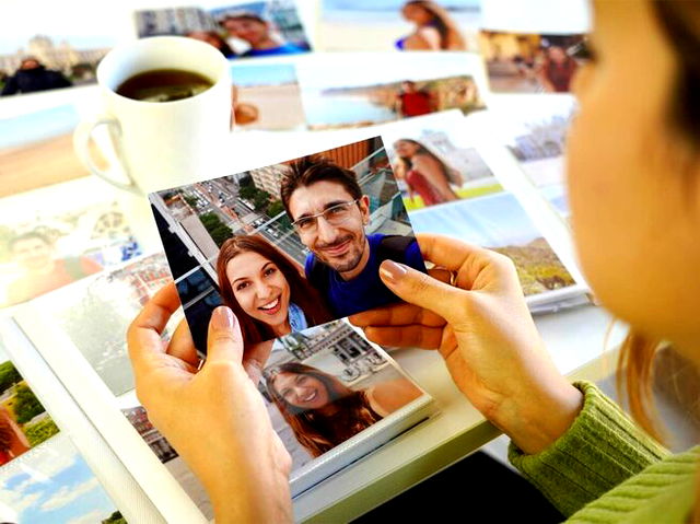 Woman looking at pictures with her ex