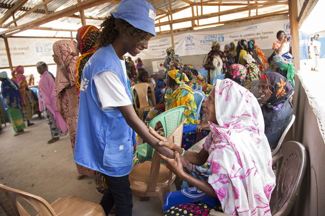 UN humanitarian Worker helping refugees