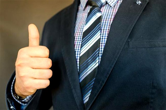 man with thumbs up