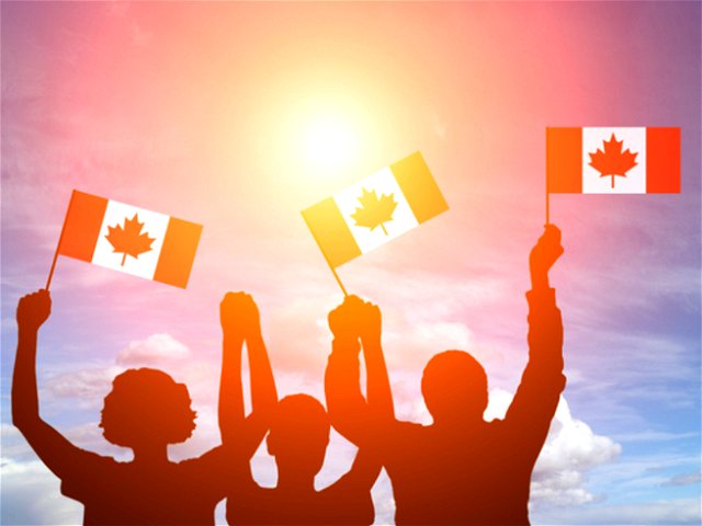Canadian flag waving sunrise