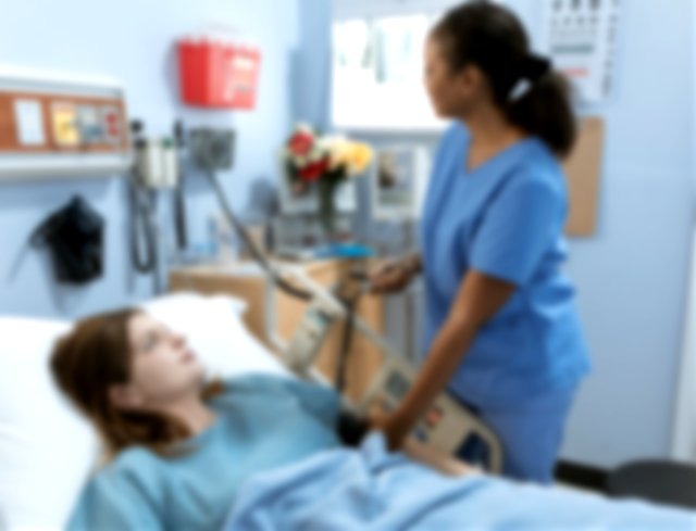 Imagen de una enfermera y su paciente