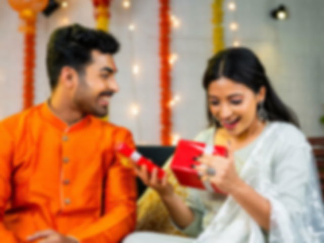 Brother gives a gift to his sister on Raksha Bandhan