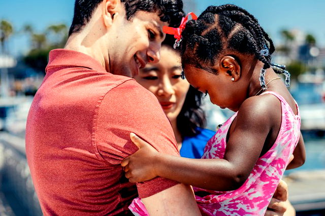 A couple adopting a child