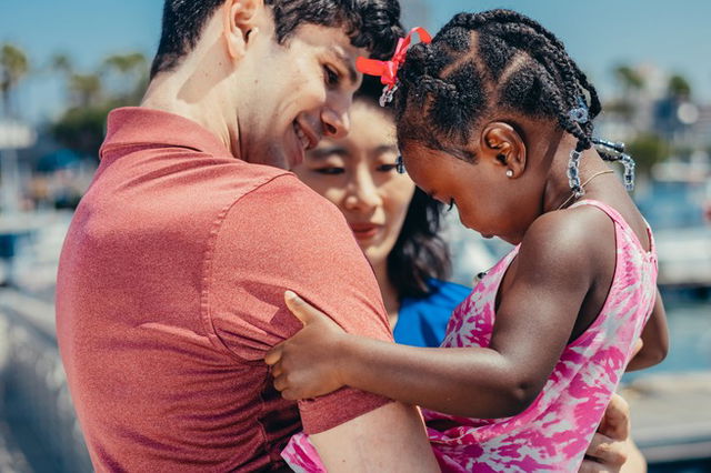 A couple adopting a child