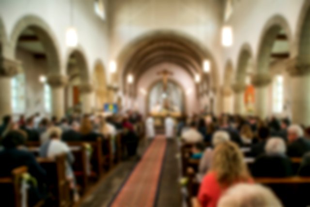 People attend mass on All Saints’ Day